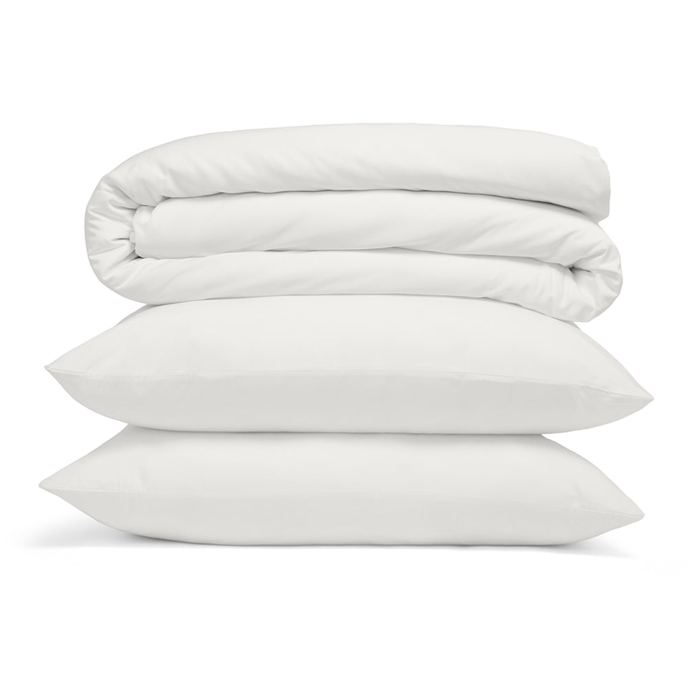Stack of white bedding on a white background