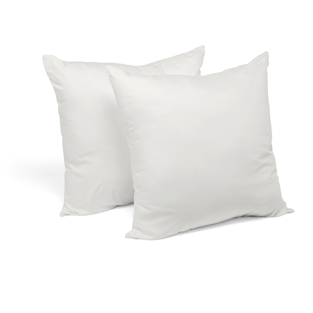 Two white pillowcases on a white background