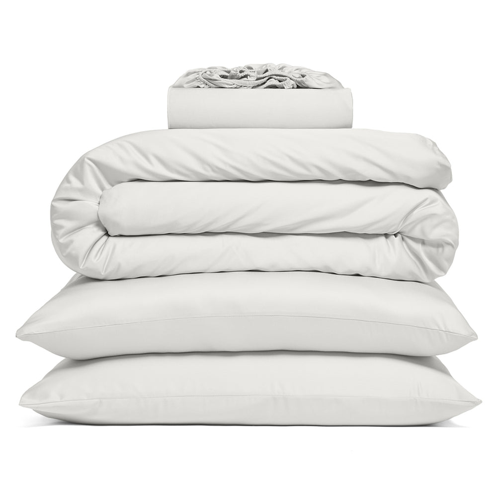 Stack of white bedding bamboo set on a white background