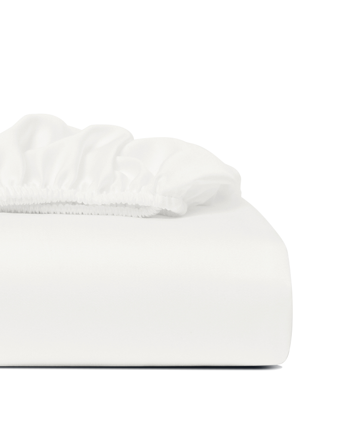 Folded white fitted sheet with visible elastic edge, neatly displayed on a transparent background.
